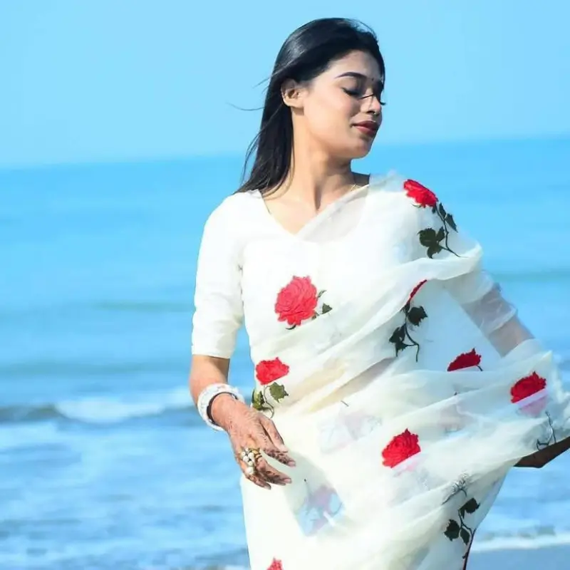 Priotoma half silk saree with floral prints and free blouse piece